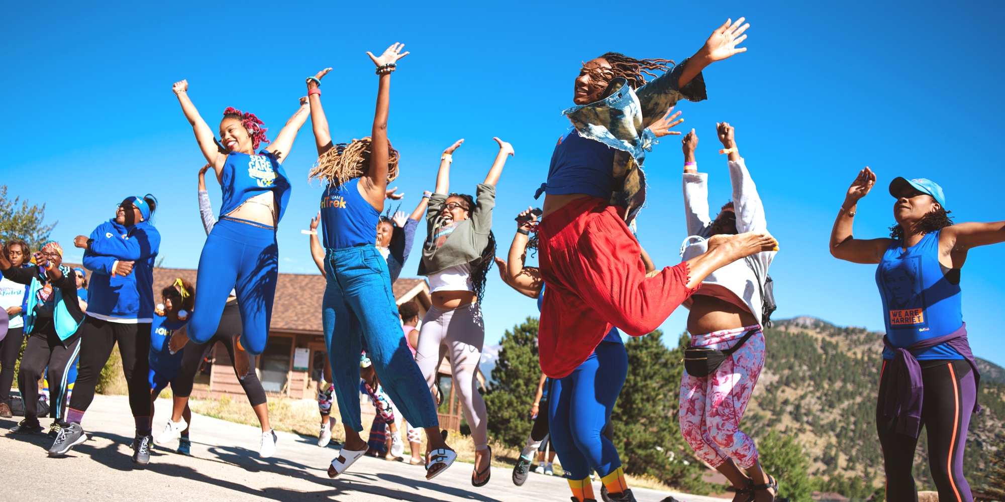 Group of GirlTREKkers jumping simultaneously